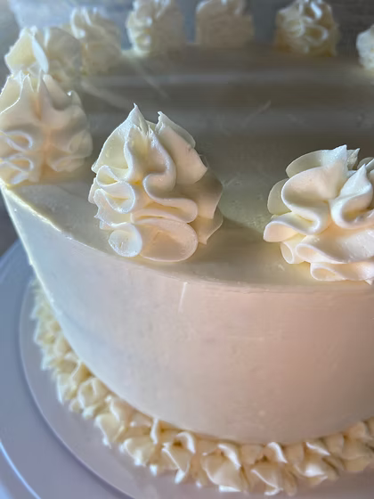Another Slice of Cake logo